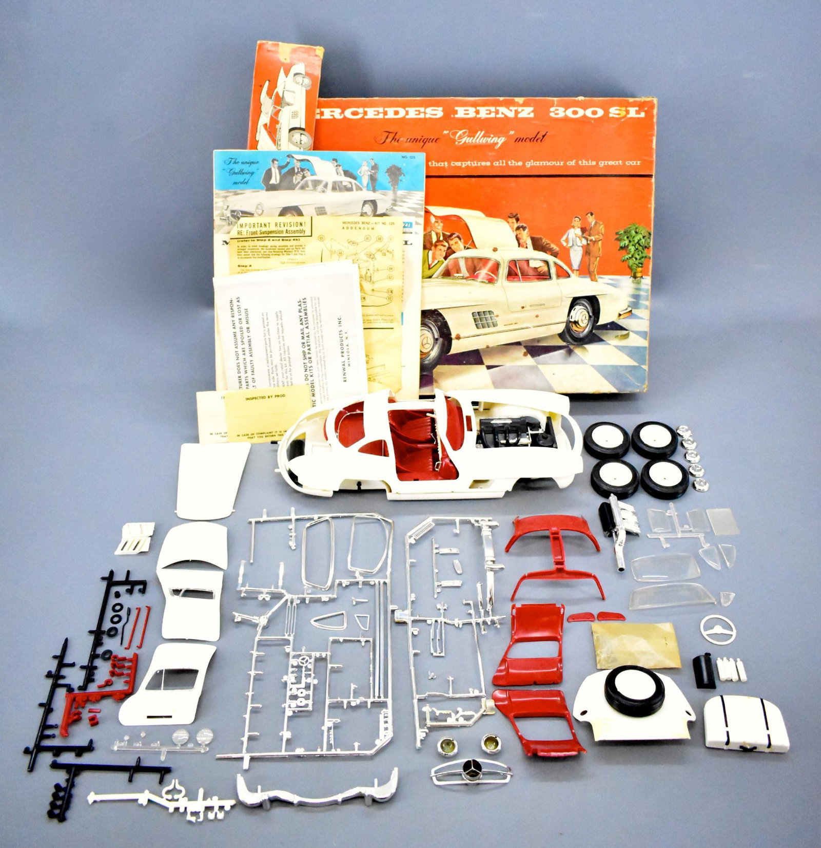 Partially built Renwal Mercedes benz 300 SL 1/12 scale: Partially built Renwal Mercedes benz 300 SL 1/12 scale model kit in original box. Kit is partially built and the bottom of one A pillar is cracked, unknown if it is complete and comes in aworn origina