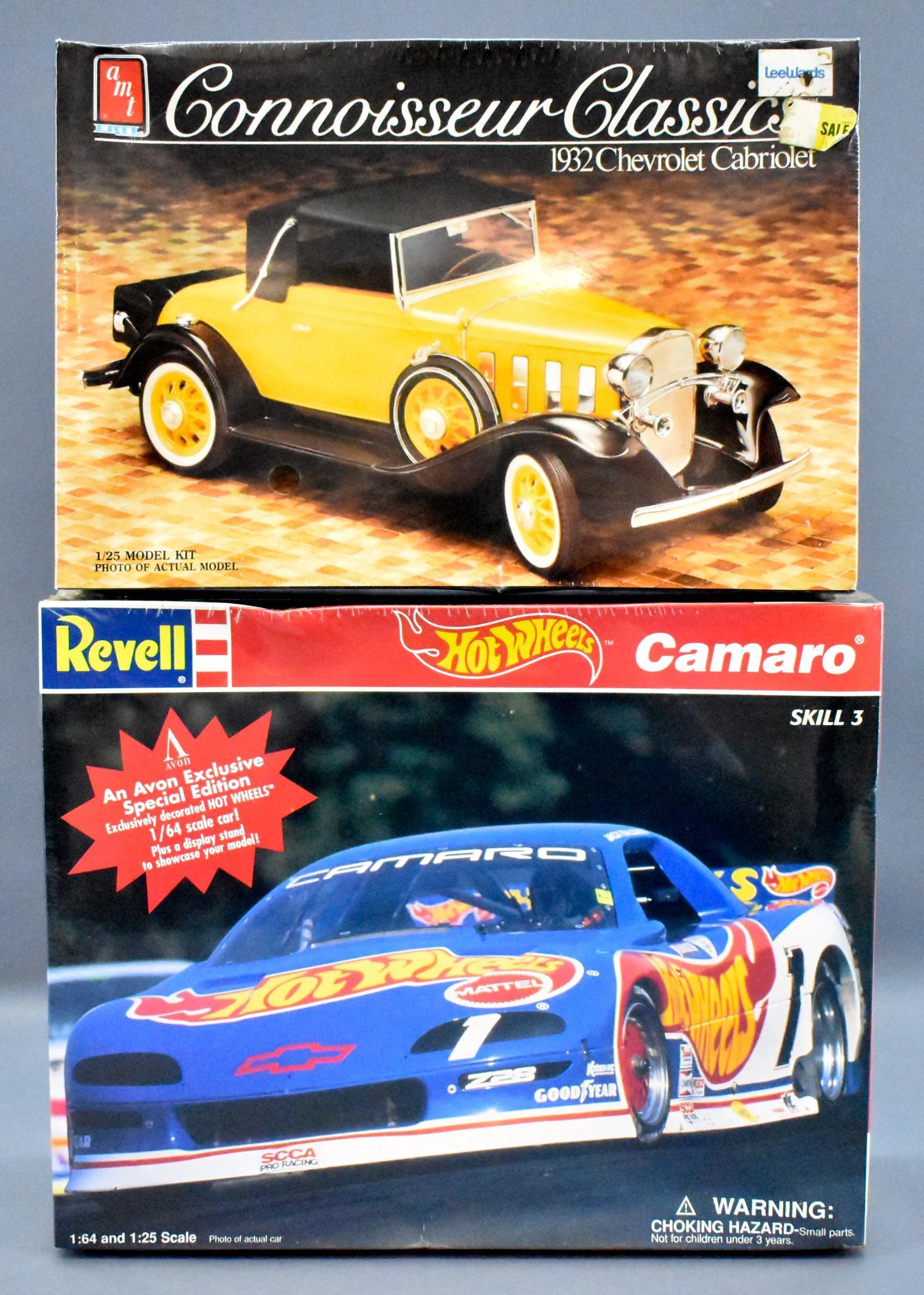 Pair of factory sealed 1/25 scale model kits in: Pair of factory sealed 1/25 scale model kits in original boxes to include an AMT / Ertl 1932 Chevy Cabriolet and a revell Hot Wheels Camaro.