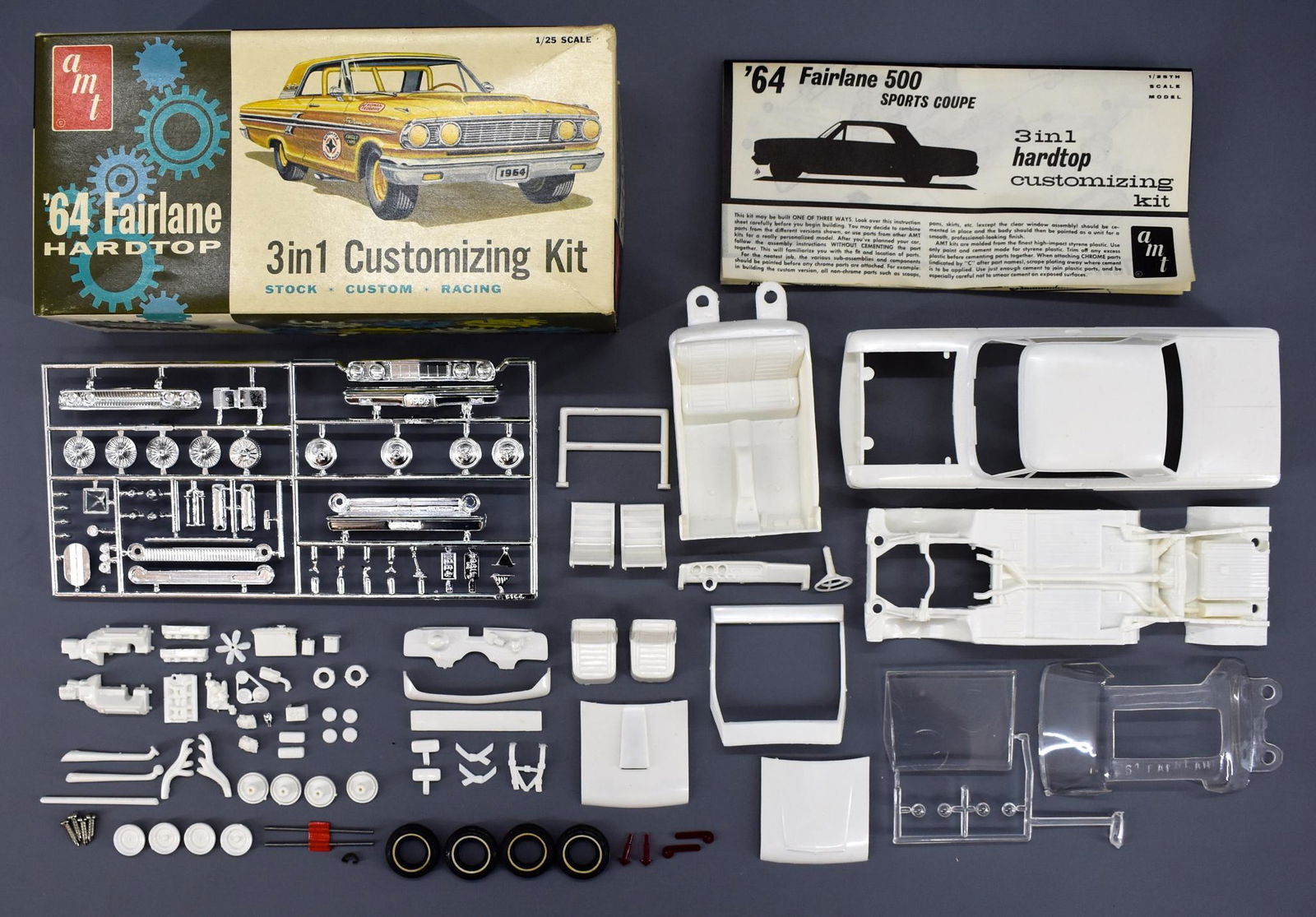 Unbuilt AMT 1964 Ford Fairlane hardtop 1/25 scale model: Unbuilt AMT 1964 Ford Fairlane hardtop 1/25 scale model kit. No work has been started but most of the white pieces are loose from the sprues. The chrome sprue has most, if not all, of the parts still