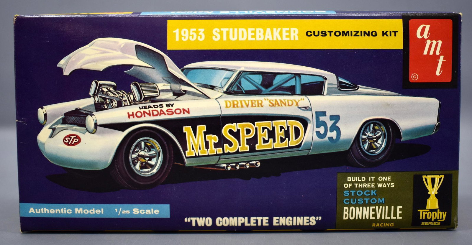 Factory sealed AMT 1953 Studebaker 2053-170 1/25 scale: Factory sealed AMT 1953 Studebaker T2053-170 1/25 scale model kit. Box is in fantastic condition, still factory taped, the only small issue is a small area of creases on the left side top of the box, 