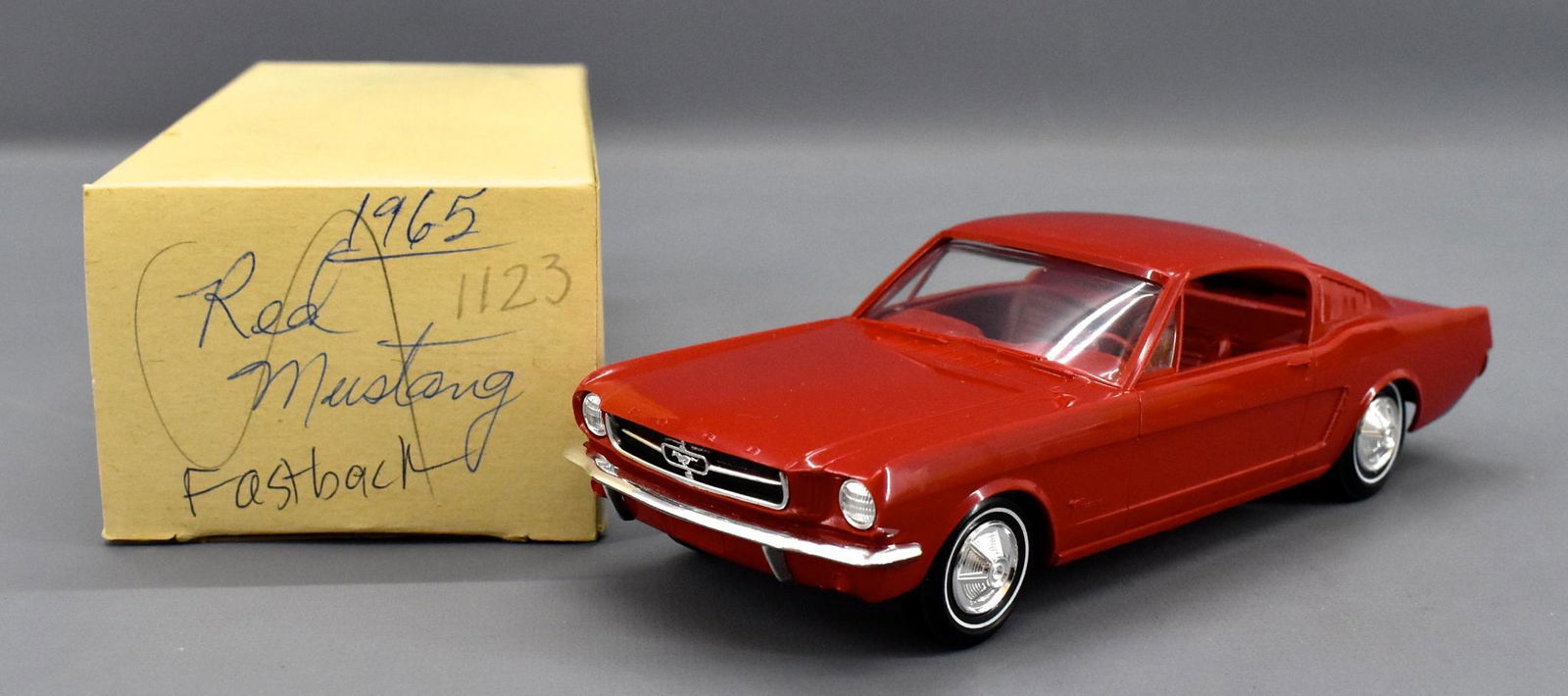 1965 Ford Mustang fastback dealer coaster promo car: 1965 Ford Mustang fastback dealer coaster promo car. A very nice and clean car with some rub marks on the drivers side and roof but otherwise very displayable as seen in the photos.