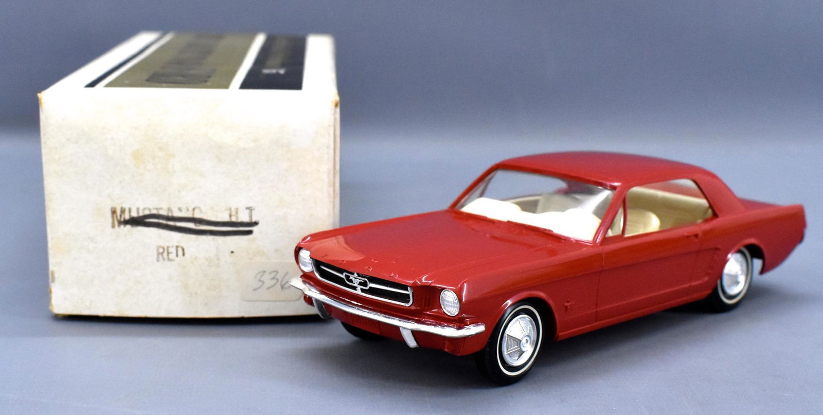 1965 Ford Mustang hardtop dealer coaster promo car in: 1965 Ford Mustang hardtop dealer coaster promo car in original box. Car is excellent near mint but the windshield glass has two very small cracks which could be replaced. The original box is in excell