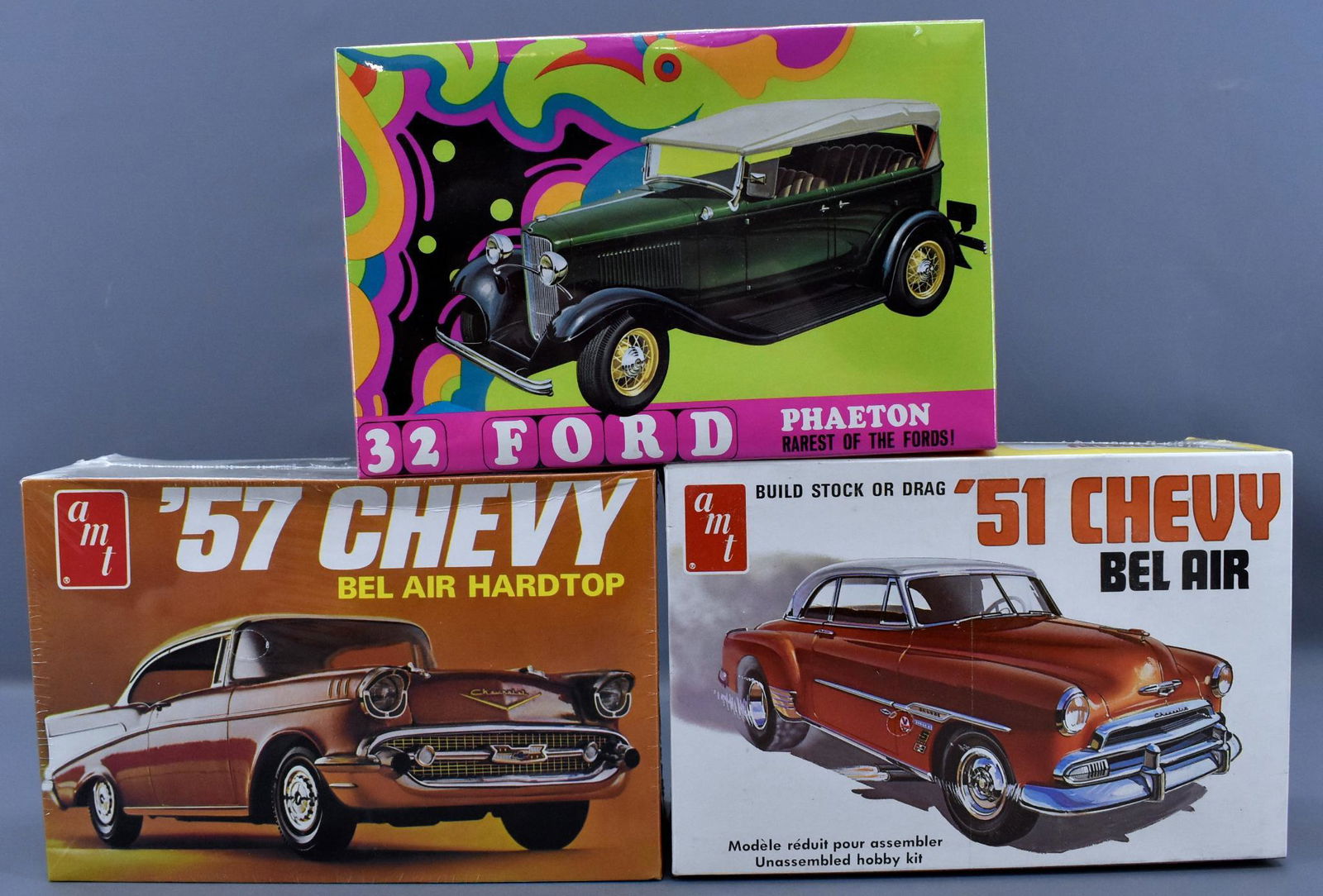 Three factory sealed AMT 1/25 scale model kits: Three factory sealed AMT 1/25 scale model kits to include '32 Ford Phaeton T324, '57 Chevy T-280 and '51 Chevy Bel Air T295. All three kits are perfectly sealed in high grade original boxes.