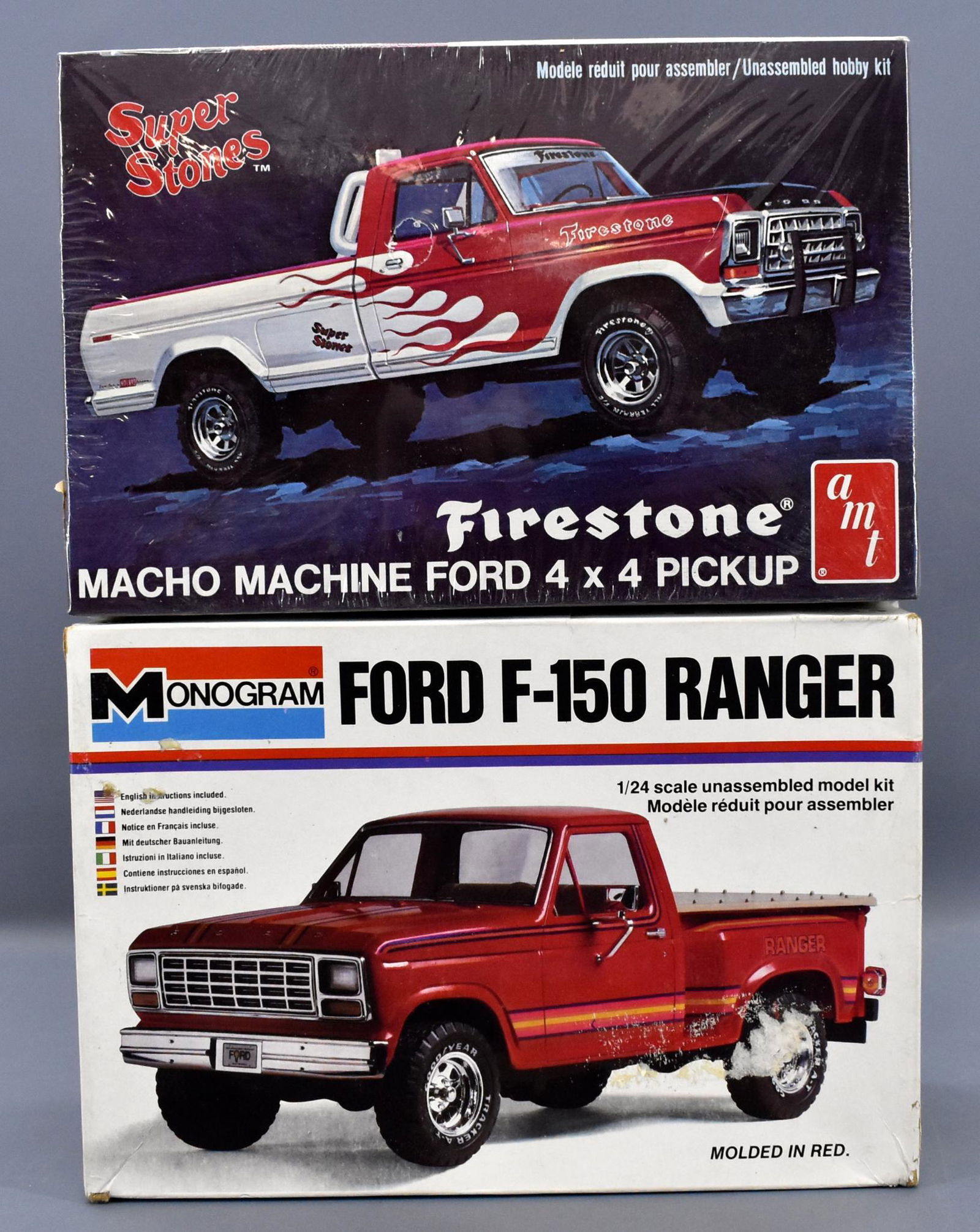 Two Mint unbuilt Ford pickup truck scale model kits: Two Mint unbuilt Ford pickup truck scale model kits to include a factory sealed AMT 1/25 Super Stones 1978 F-350 in a high grade original box plus an open box, sealed bag Monogram 1/24 F-150 Ranger 22