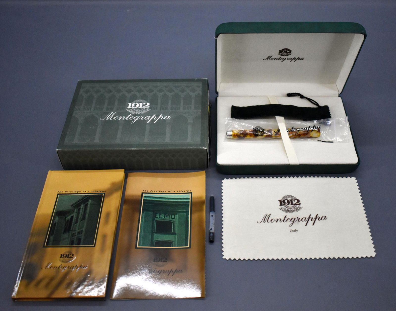Montegrappa Harmony Amber luxury fountain pen in: Montegrappa Harmony Amber luxury fountain pen in original box. Pen has been used but is in excellent to near mint condition with a near mint original box, original paperwork and an excellent outer box