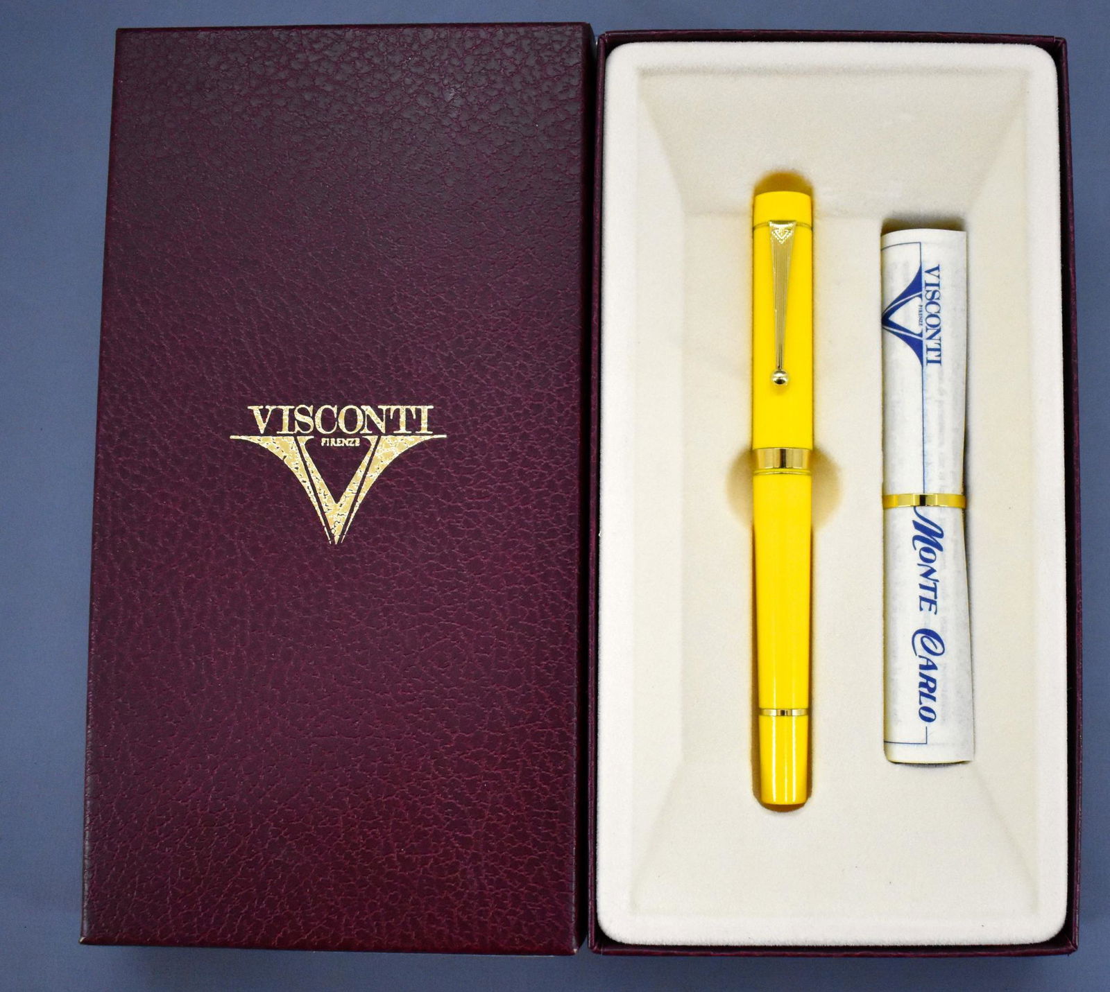 Visconti Monte Carlo fountain pen in original box: Visconti Monte Carlo fountain pen in original box Mandarin Yellow. The pen has been used and is in excellent condition with a near mint original box and original paperwork. The nib is only marked Fire