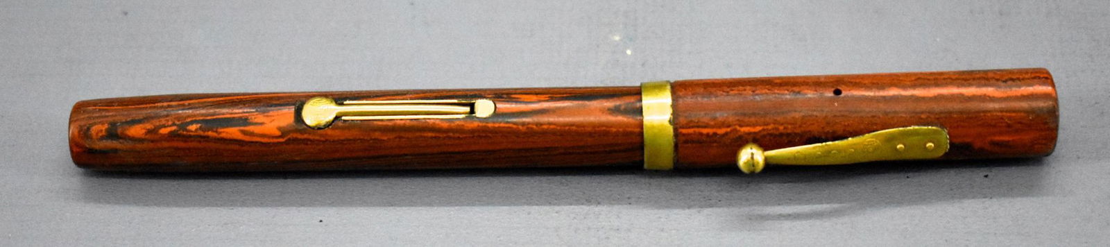 Vintage Waterman's Ideal 54 fountain pen Red Wood Grain: Vintage Waterman's Ideal 54 fountain pen, Red Wood Grain. Used but in excellent condition cosmetically, nib has what appears to be a key hole and is marked Brown Waterman's Ideal Reg. U.S. Pat. Off. A