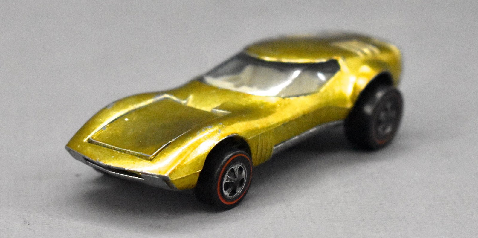 Redline Hot Wheels gold US Torero: Redline Hot Wheels gold US Torero, nice and clean but has wear to the chrome on the wheels and has a spotty base.