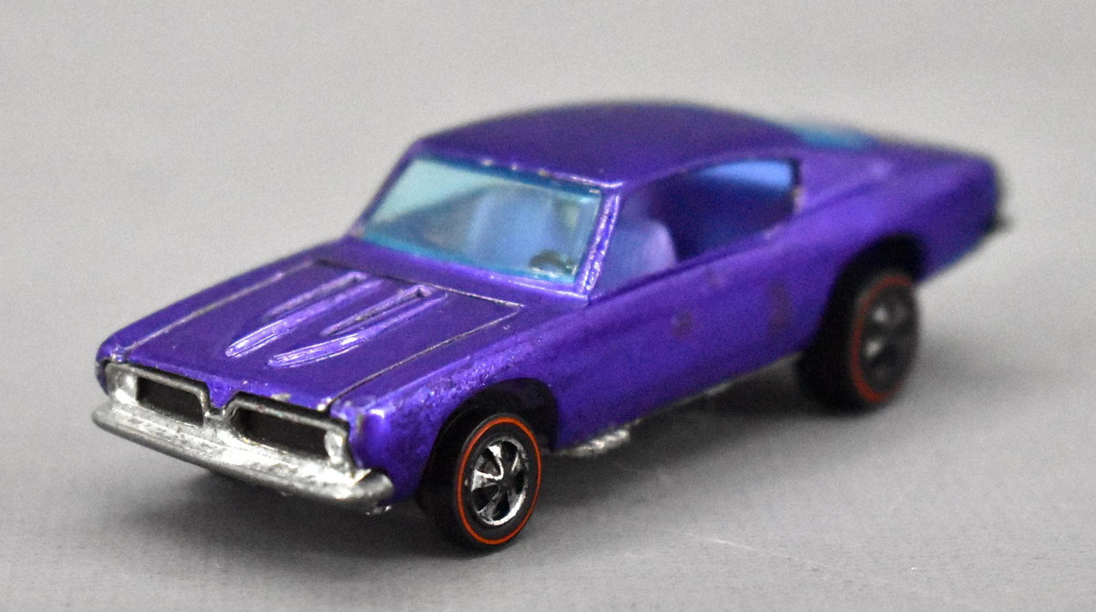 Redline Hot Wheels purple HK Custom Barracuda with: Redline Hot Wheels purple HK Custom Barracuda with purple interior, very nice and clean with paint loss from the taillights possibly some sticker residue on the sides, chrome loss from the rims and a 