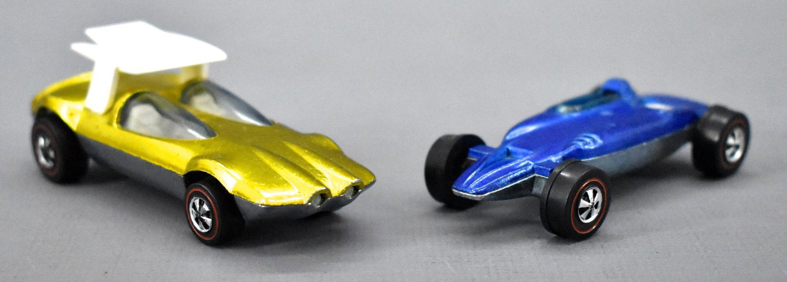 Redline Hot Wheels blue HK Shelby Turbine and yellow US: Redline Hot Wheels blue HK Shelby Turbine and yellow US Swingin Wing, both cars are very nice and clean with little if any play / paint wear and both have shiny bases.