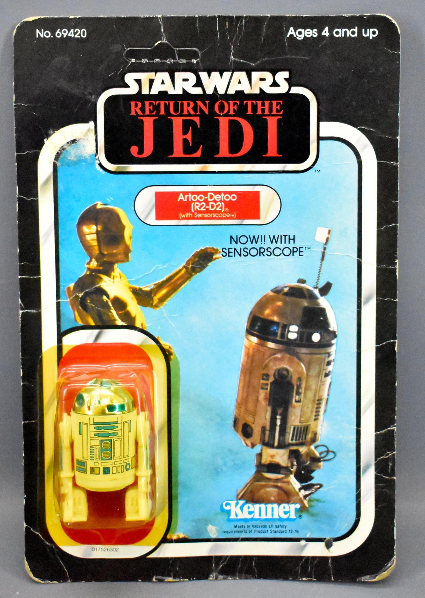 Kenner Star Wars ROTJ R2-D2 with sensorscope on sealed: Kenner Star Wars ROTJ R2-D2 with sensorscope on sealed blister card, the figure is mint but the card has creases, a hole in the bottom but is unpunched and the blister has been crushed.