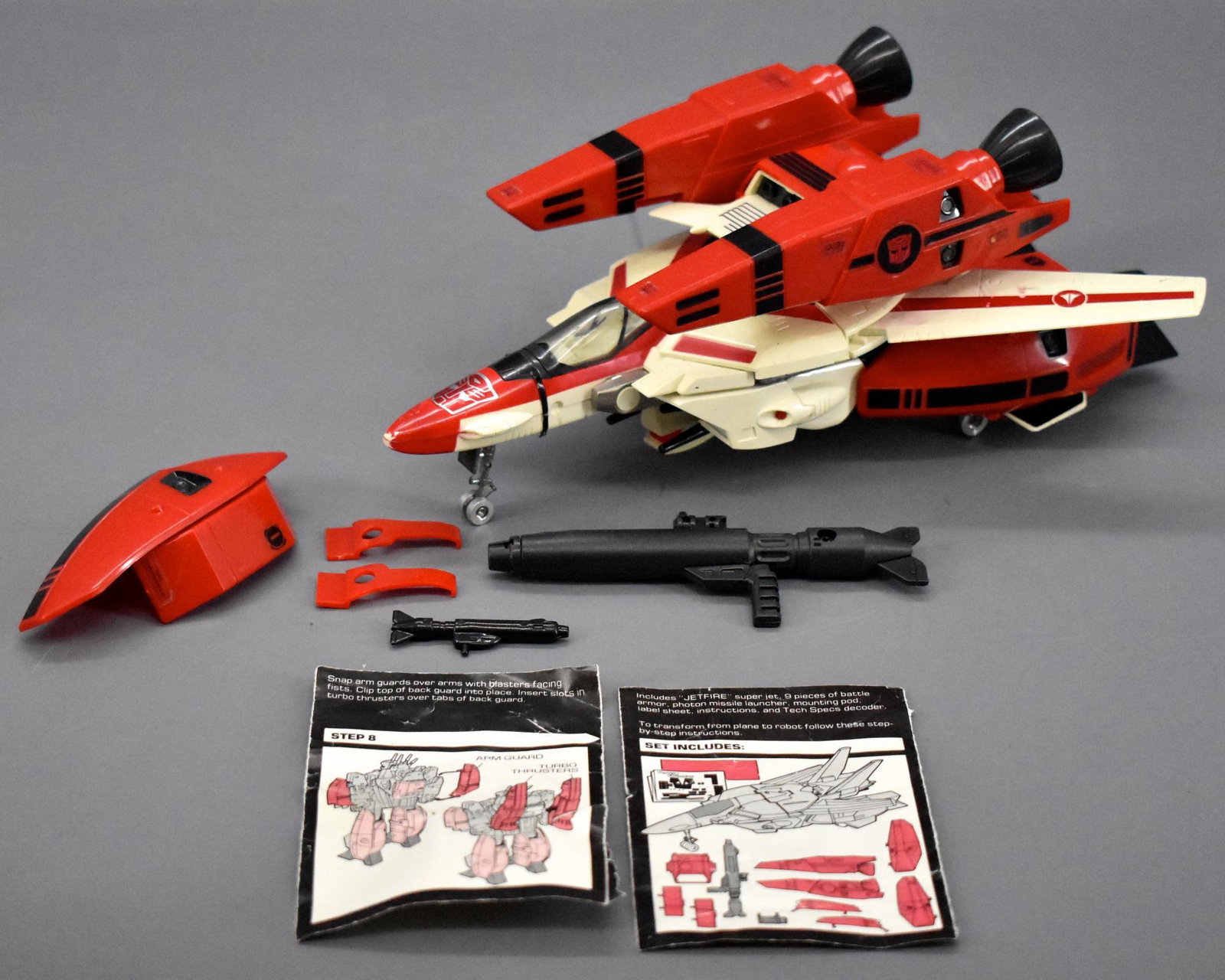Hasbro Takara G1 Transformers Jetfire with complete: Hasbro Takara G1 Transformers Jetfire with complete armor. One piece of armor has broken tabs and there is a missing arm but it comes with all of the weapons and a partial original instruction sheet.