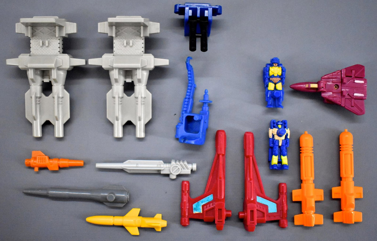 Hasbro Transformers G1 mixed group of parts and weapons: Hasbro Transformers G1 mixed group of parts and weapons. The top wings are broken off on the jet but the rest of the pieces are in excellent condition. Lot numbers 234-238 are my from my 9 year old so