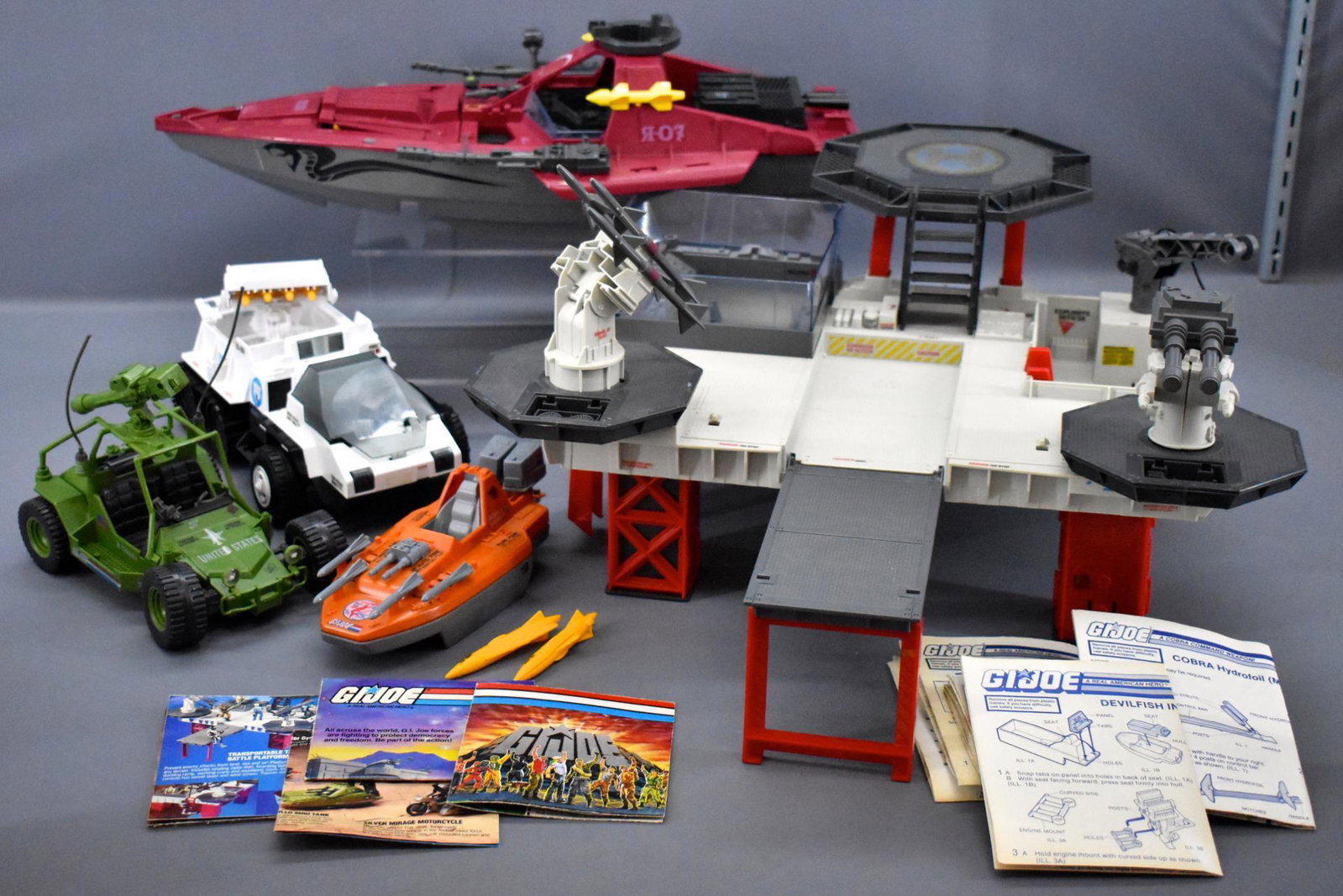 Hasbro 1980's GI Joe Vehicle group and Tactical Battle: GI Joe Vehicle Lot , all may be missing a few parts here and there. Group includes a Devil Fish that is near complete, a Hydrofoil Moray that seems to have 90% + of its parts, an awe Striker dune bugg