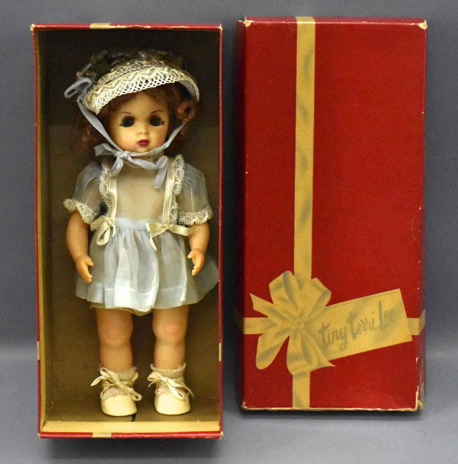 Vintage redhead Tiny Terri Lee doll in original box: Vintage redhead Tiny Terri Lee doll in original box. Doll is in near mint condition but her eyes will not close, has original curls but some of them are a bit loose. The original box is complete with