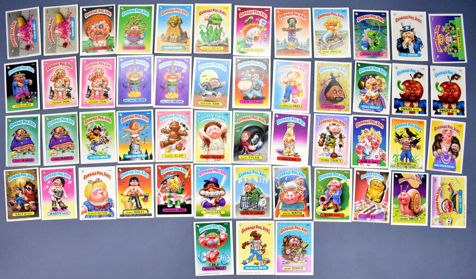 Group of 51 Garbage Pail Kids cards / stickers 101-150: Group of 51 Garbage Pail Kids cards / stickers 101-150 b series. These were never in sleeves so they are likely in the VG-EX range. These may include cards that are identical but have variations like