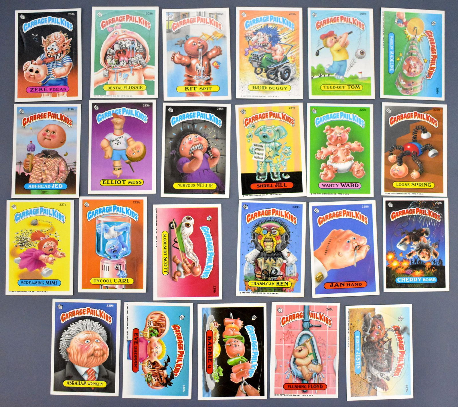 Group of 23 Garbage Pail Kids cards / stickers 200 and: Group of 23 Garbage Pail Kids cards / stickers 200 and up b series. These were never in sleeves so they are likely in the VG-EX range. These may include cards that are identical but have variations li