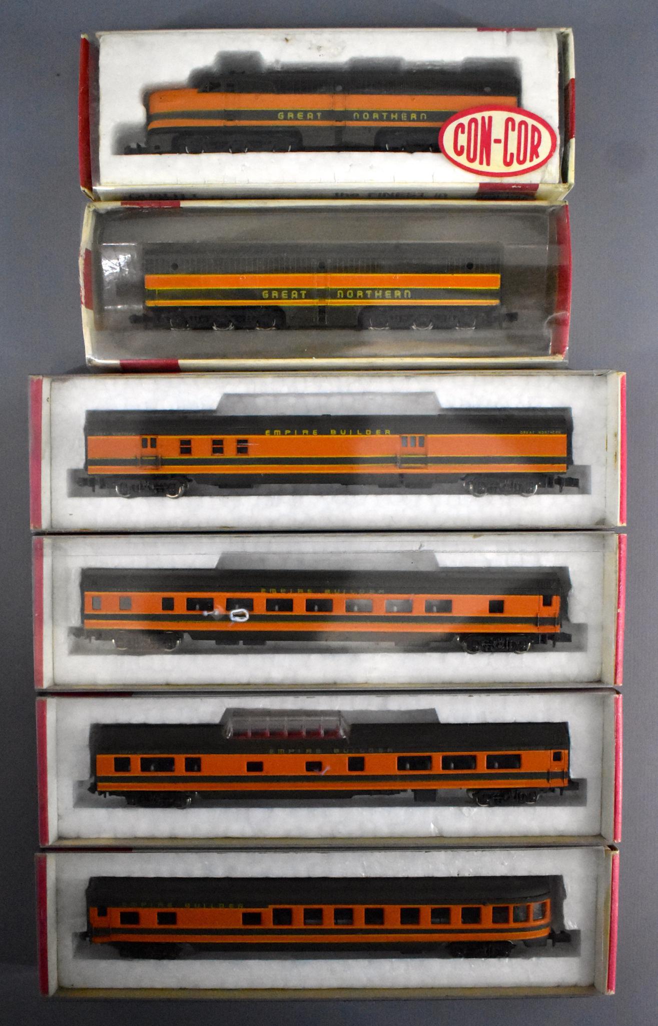 Con Cor N gauge Great Northern diesel passenger set in: Con Cor N gauge Great Northern diesel passenger set in original boxes to include Alco PA-1 powered unit, PB-1 dummy unit and four passenger cars, C6-7 in good original boxes.