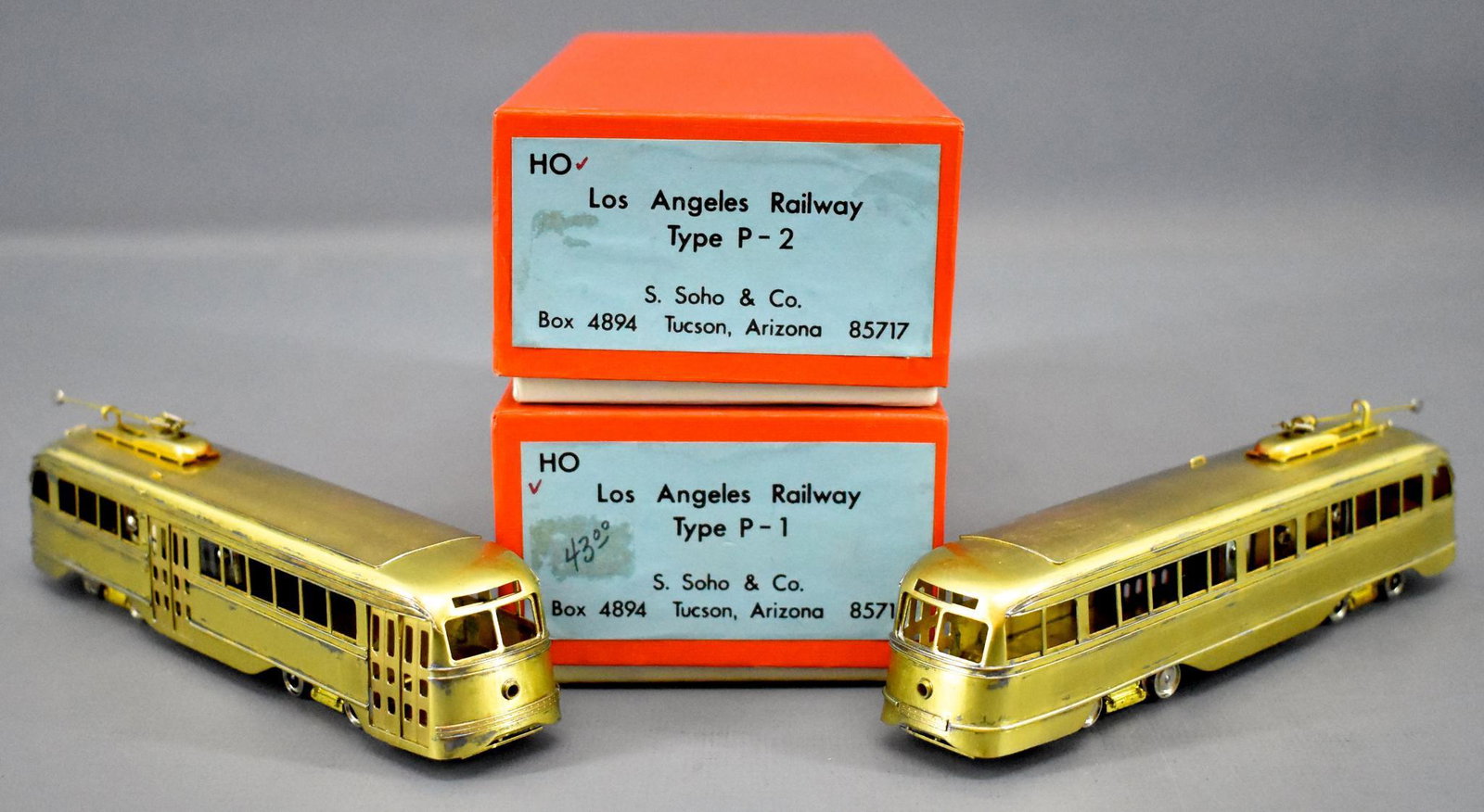 S Soho HO brass Los Angeles Railway P-1 and P-2 trolley: S Soho HO brass Los Angeles Railway P-1 and P-2 trolley streetcars in original boxes, both are C8-9 in excellent original boxes with original foam inserts.