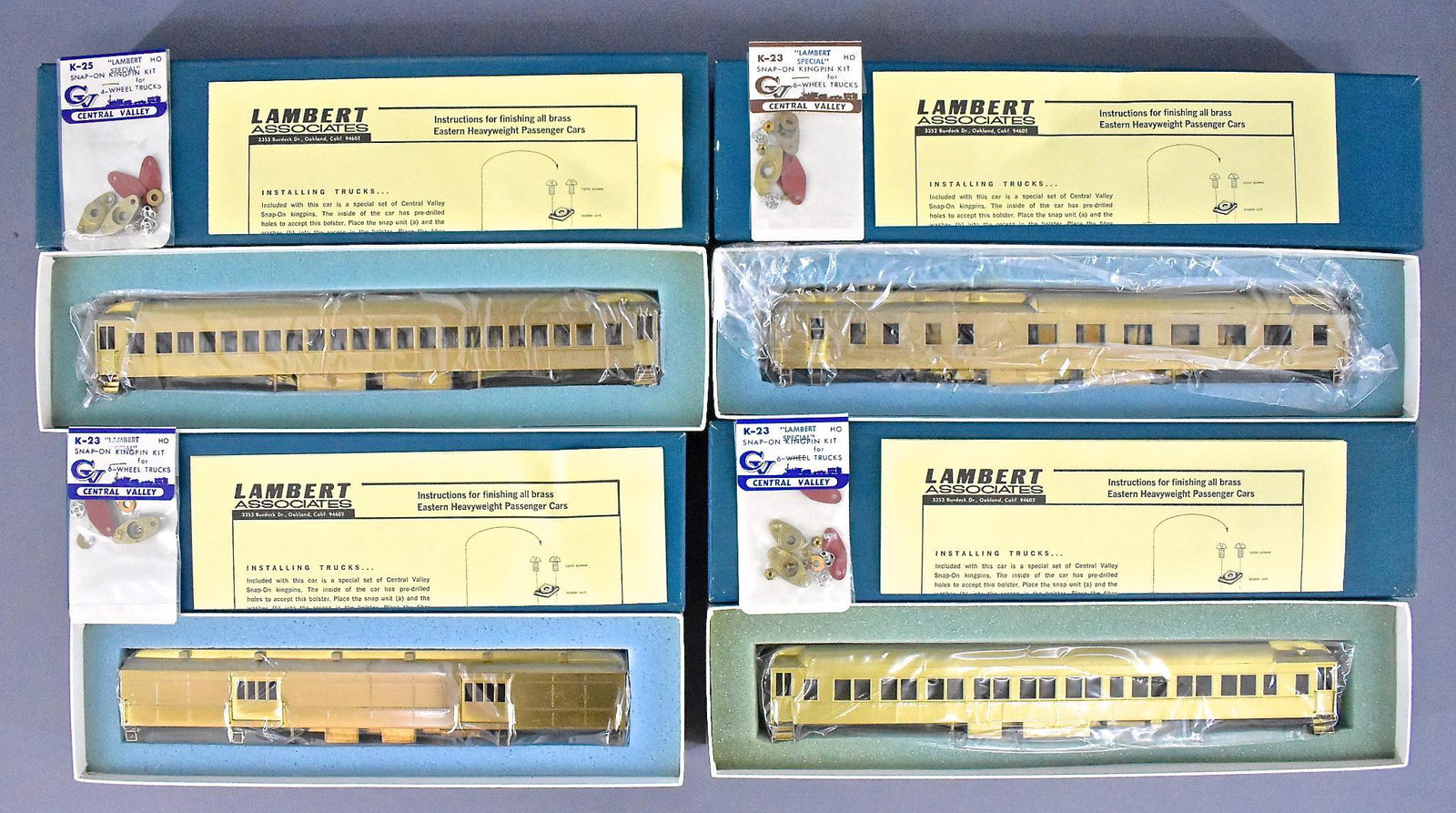 Four Lambert HO scale brass Eastern Heavyweight: Four Lambert HO scale brass Eastern Heavyweight passenger cars in original boxes to include 814 Pullman, 822 diner, 842 coach and 872 baggage, all are C8-9 with original paperwork in excellent origina