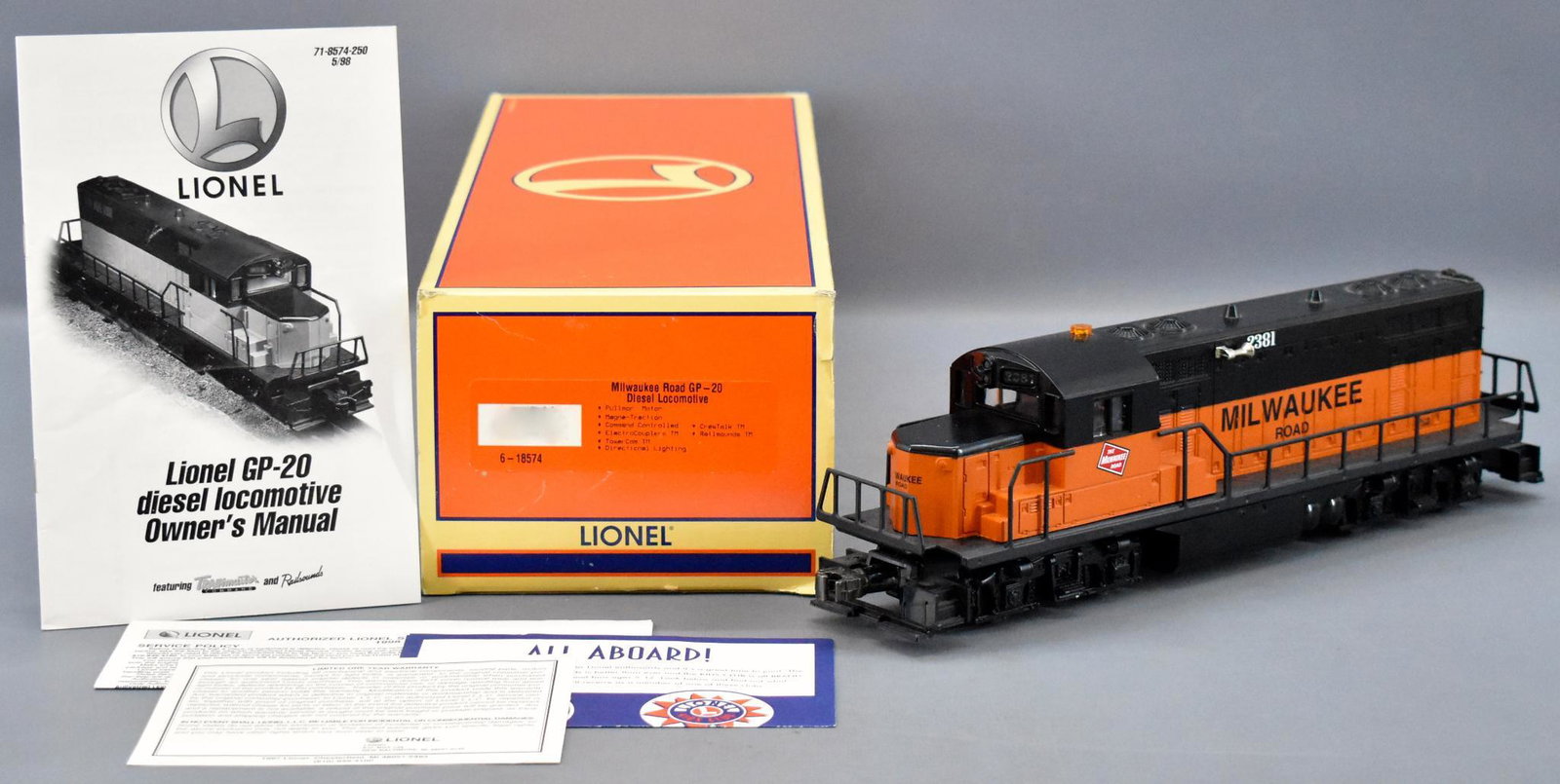 Lionel modern era O 18574 Milwaukee Road GP-20 diesel: Lionel modern era O gauge 18574 Milwaukee Road GP-20 diesel locomotive in original box. Unit shows light run time and is C8 in a very good original box with original insert and original paperwork.