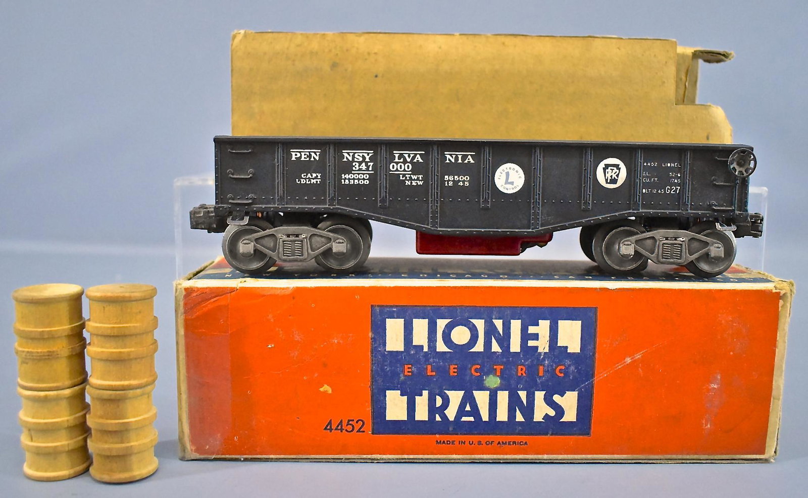 Lionel postwar O 4452 electronic set Pennsylvania: Lionel postwar O 4452 electronic set Pennsylvania gondola in original box, looks very nice with minor wear but has one reproduction decal. Comes with a poor original box with an original liner and fou