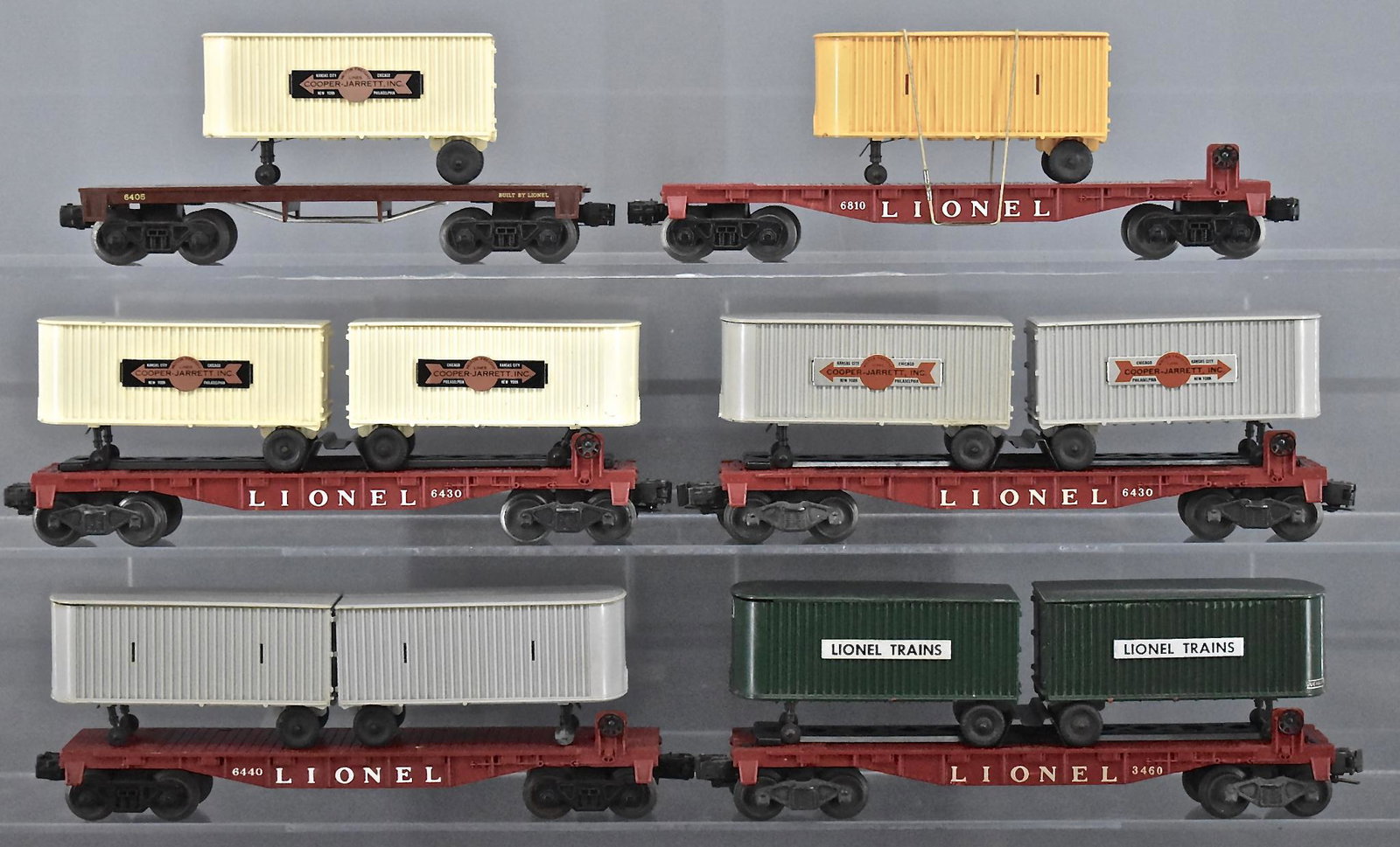 Group of six Lionel postwar O gauge tractor trailer: Group of six Lionel postwar O gauge tractor trailer flat cars. Group includes two 6430, 6450, 6460, 6810 and 6405, C5-7.