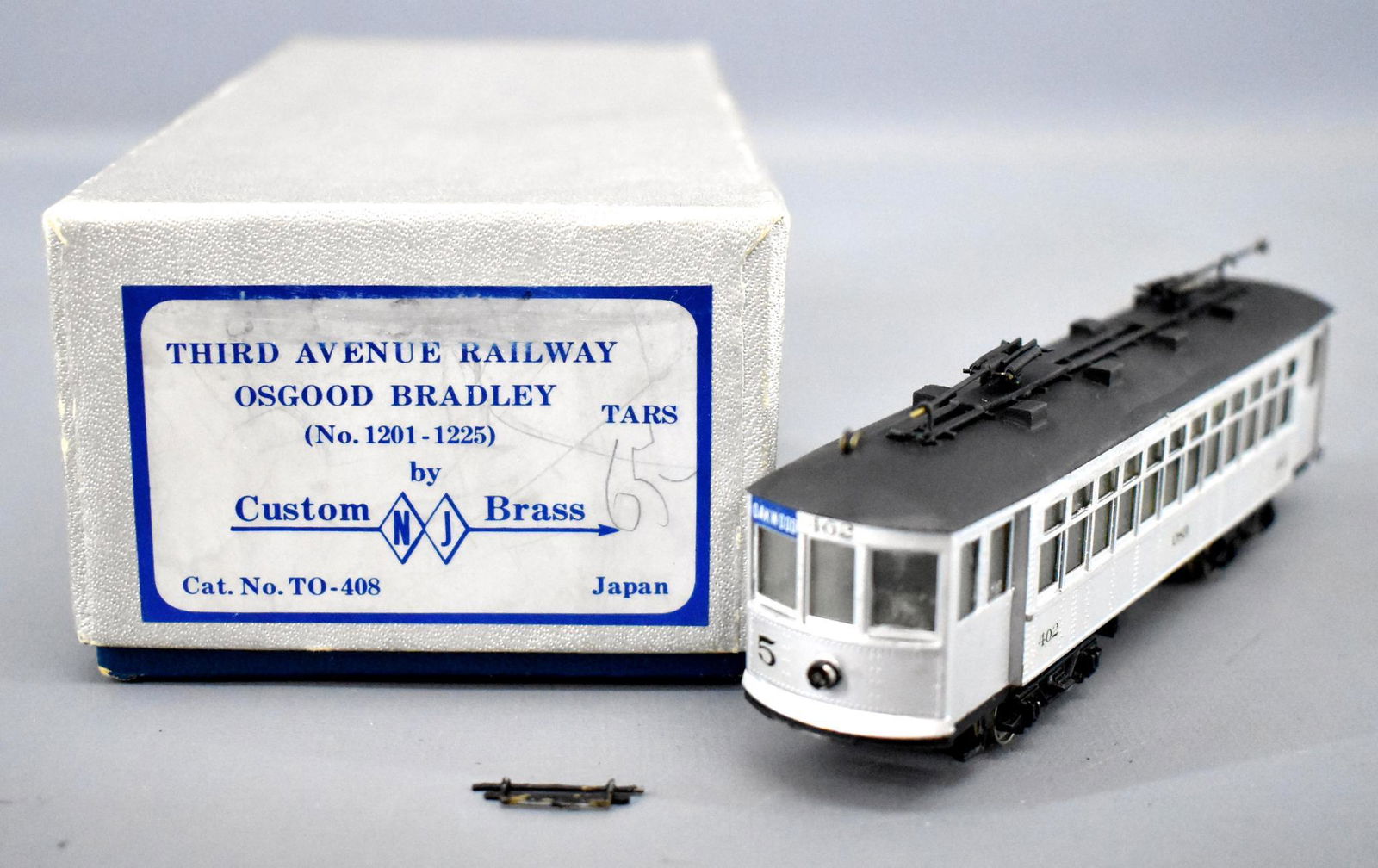 NJ International HO scale brass Third Avenue Railway: NJ International HO scale brass Third Avenue Railway Osgood Bradley in original box, cable car is custom painted and C7 as it has light wear and errant paint in spots, one guard rail is loose and need