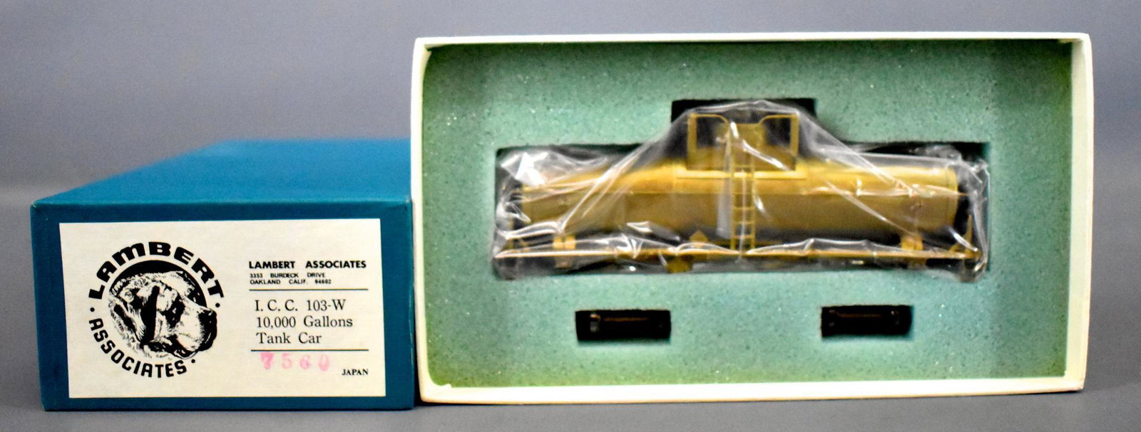 Lambert HO scale brass ICC 103-w 10,000 gallons tank: Lambert HO scale brass ICC 103-w 10,000 gallons tank car in original box, tank car is C8-9 having never had trucks installed, the trucks are included here, comes in an excellent original box.