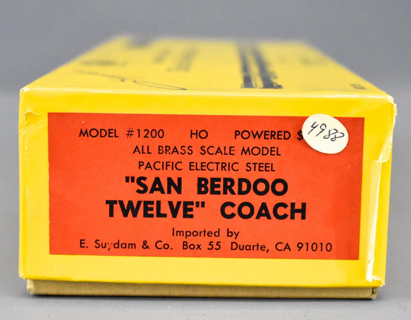 Factory sealed E. Suydam HO scale brass Pacific: E. Suydam HO scale brass Pacific Electric San Berdoo Twelve Coach in original factory sealed box. This box is factory sealed, tape on one side has come up but never opened, the box is excellent