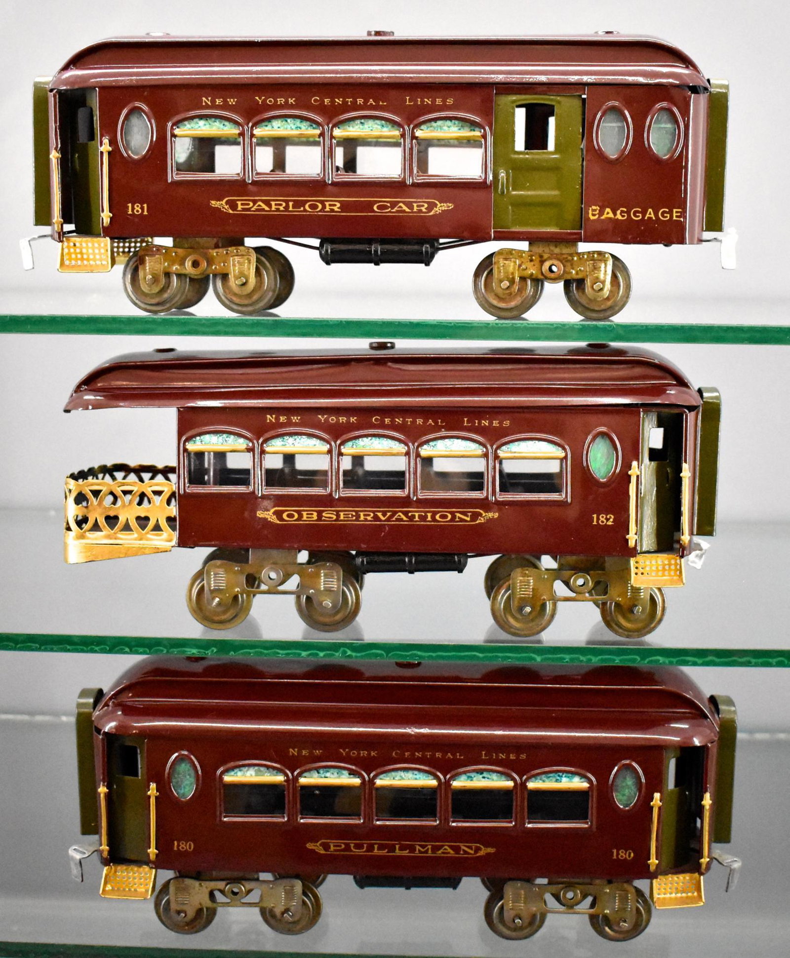 Repainted Lionel MFG Co standard gauge passenger car: Repainted Lionel MFG Co standard gauge passenger car set to include 180 Pullman, 181 parlor combine and 182 observation cars with embossed type on the bottoms of the cars, definitely not professionall