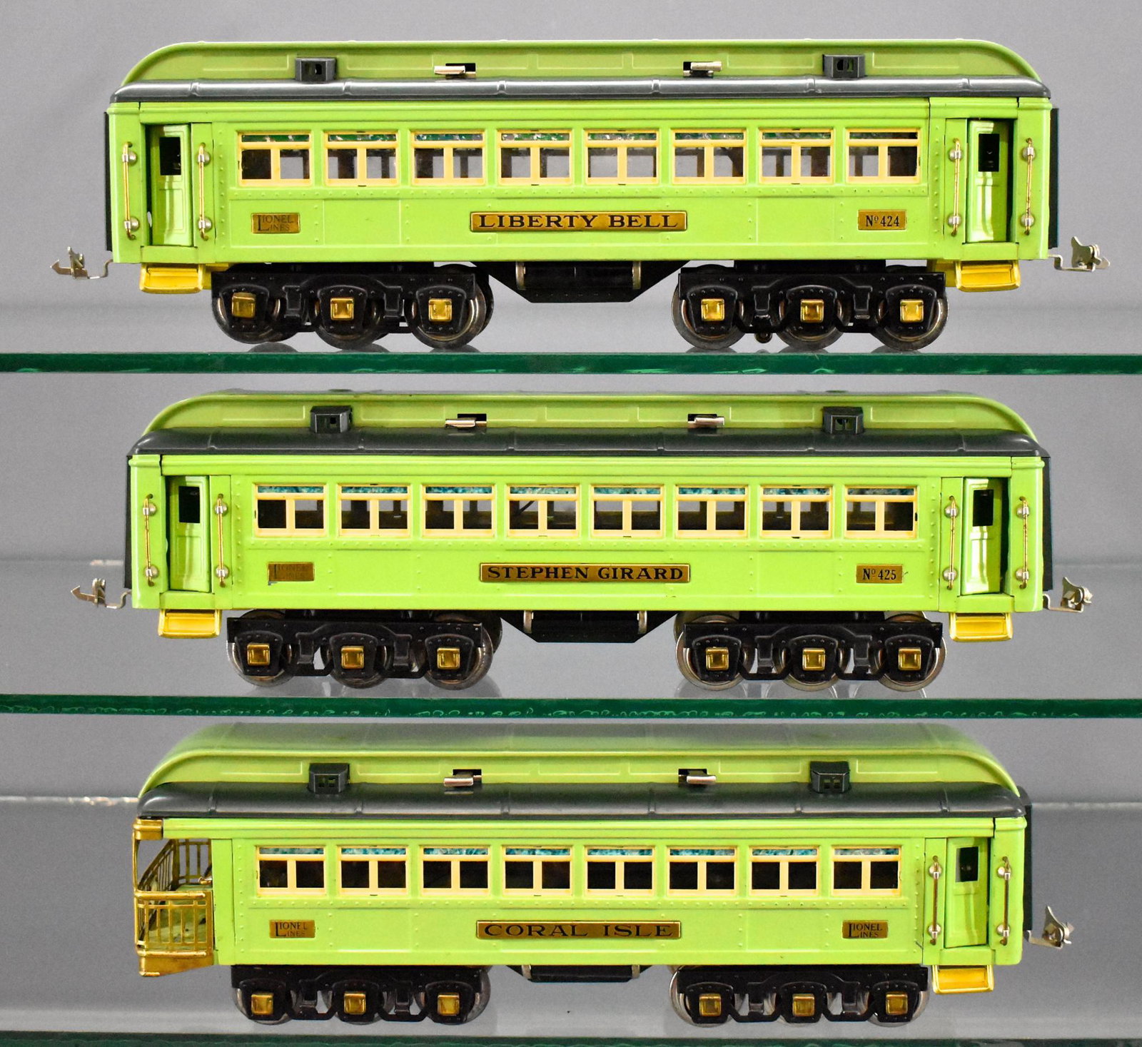 Lionel prewar standard gauge Stephen Girard passenger: Lionel prewar standard gauge Stephen Girard passenger cars to include 424 Liberty Bell, 425 Stephen Girard and 426 Coral Isle. The cars are comprised of original bodies with reproduction roofs. Everyt