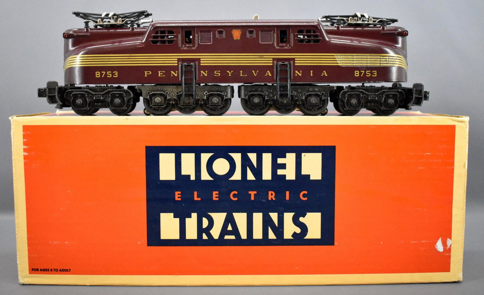 Lionel modern era O 8753 GG-1 electric locomotive with: Lionel modern era O 8753 GG-1 electric locomotive with incorrect box, shows light run time and is C8 with an Amtrak 18303 box with original insert.