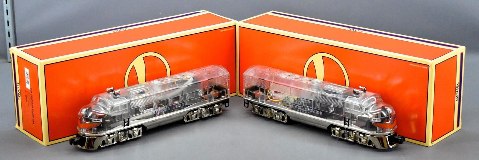 Lionel modern era O gauge 38150 Clear Cab F3 AA set in: Lionel modern era O gauge 38150 Clear Cab F3 AA set in original box. Units show very light run time and are C8-9 with excellent original boxes and a shipping carton that they will be shipped in.