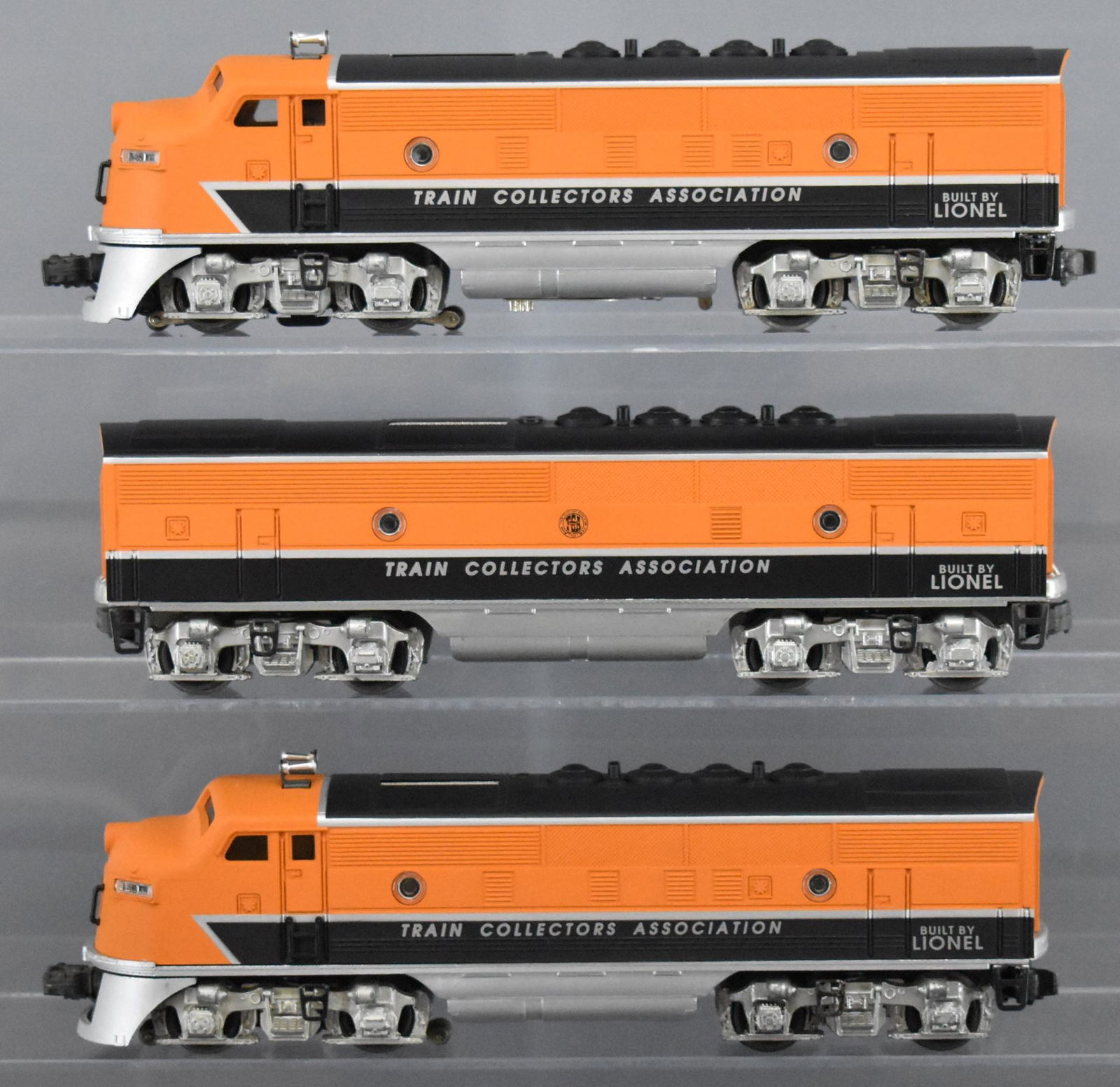TCA Lionel F3 ABA diesel locomotive set with postwar: TCA Lionel F3 ABA diesel locomotive set with postwar frames, frames show moderate run time and are clean with no battery damage. The shells are C9+.