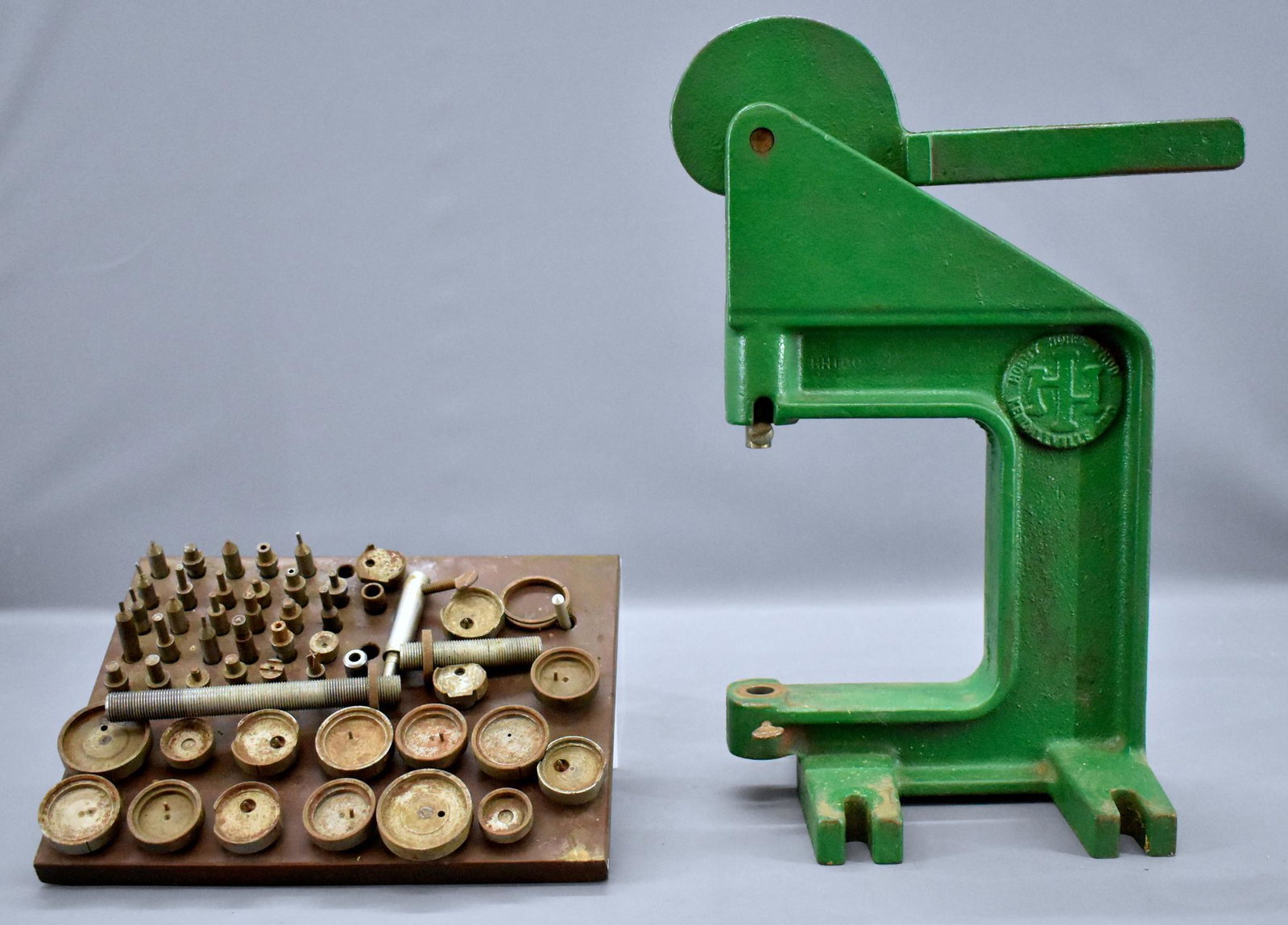 Hobby Horse HH100 rivet press with wheel cups for: Hobby Horse HH100 rivet press with wheel cups for Lionel trains and more. Includes a used but working rivet press with seventeen (17) wheel cups (two smaller ones are damaged), thirty (30) rivet tools
