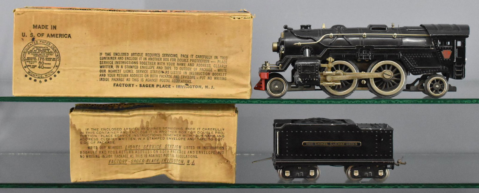 Lionel prewar standard gauge 1835E steam locomotive and: Lionel prewar standard gauge 1835E steam locomotive and whistle tender in original boxes. The locomotive appears to be all original but the tender does appear to have been restored with just the shell