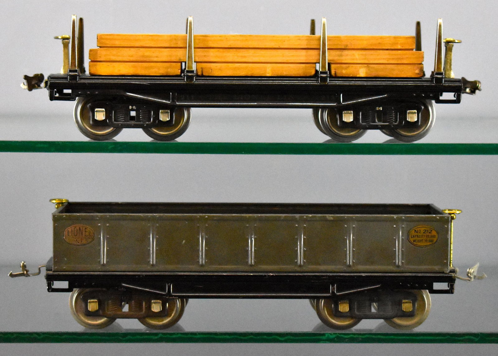 Lionel prewar standard gauge 211 212 freight cars: Lionel prewar standard gauge 211 flat car with lumber load and 212 gray gondola, C6-7.