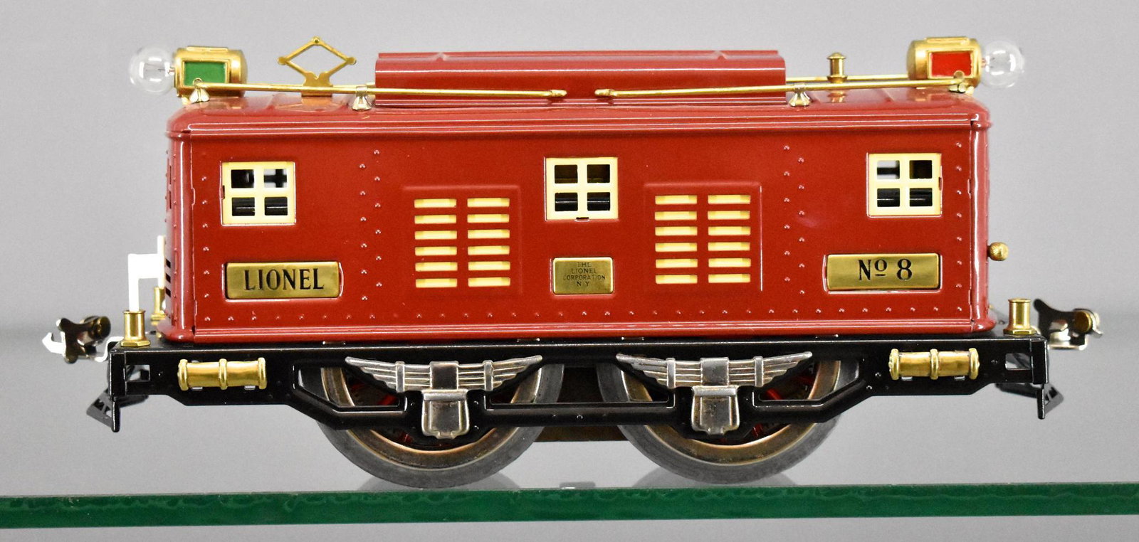 Restored Lionel prewar standard gauge Red No 8 box cab: Restored Lionel prewar standard gauge Red No 8 box cab electric locomotive. The chassis (wheels and motor) is original but it is possible that the body shell and frame are reproductions or have just b