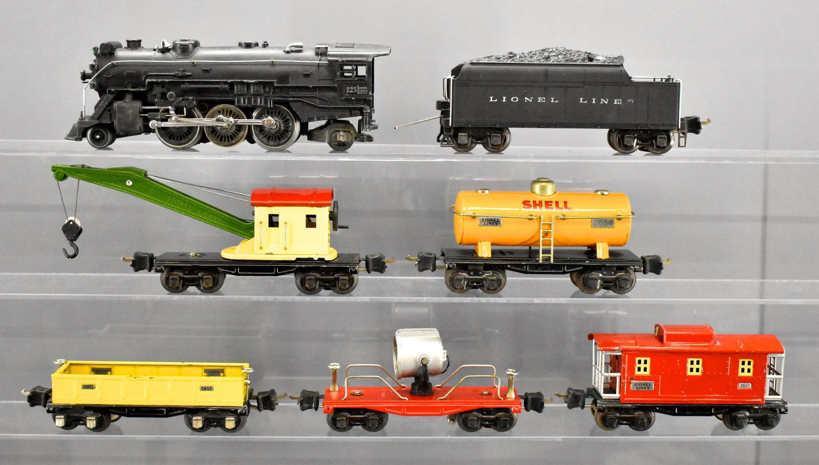 Lionel prewar O gauge steam freight set with 225 2235T: Lionel prewar O gauge steam freight set with 225 steam locomotive, 2235T tender, 2652 gondola, 2654 Shell tank car, 2660 crane, 2620 searchlight car and 2657 caboose, C6.