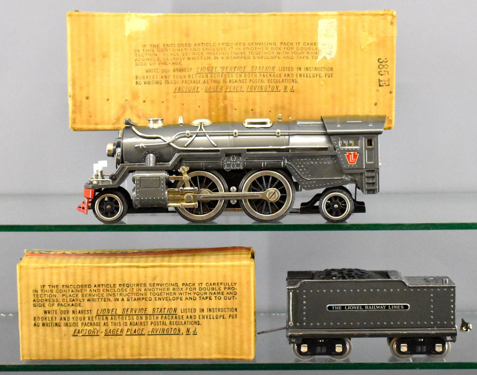 Lionel prewar standard gauge 385E steam locomotive and: Lionel prewar standard gauge 385E steam locomotive and 385W tender in gray with all nickel trim, extremely nice and has all original parts but there are a couple tiny paint touch ups, one on e the loc
