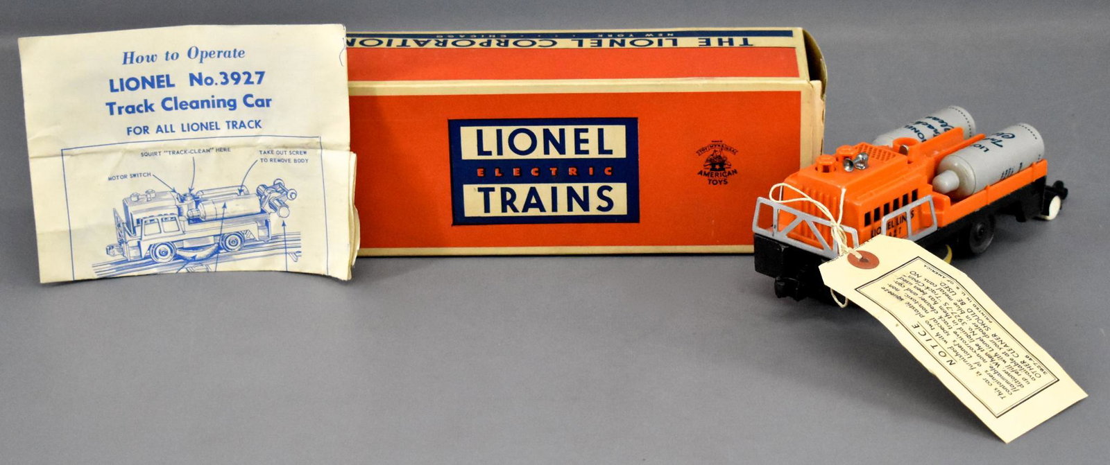 Lionel postwar O 3927 track cleaning car in original: Lionel postwar O 3927 track cleaning car in original box, shows to have been used very little and is C7+ with original bottles, a crisp original instruction sheet and 3927-46 notice in an excellent or