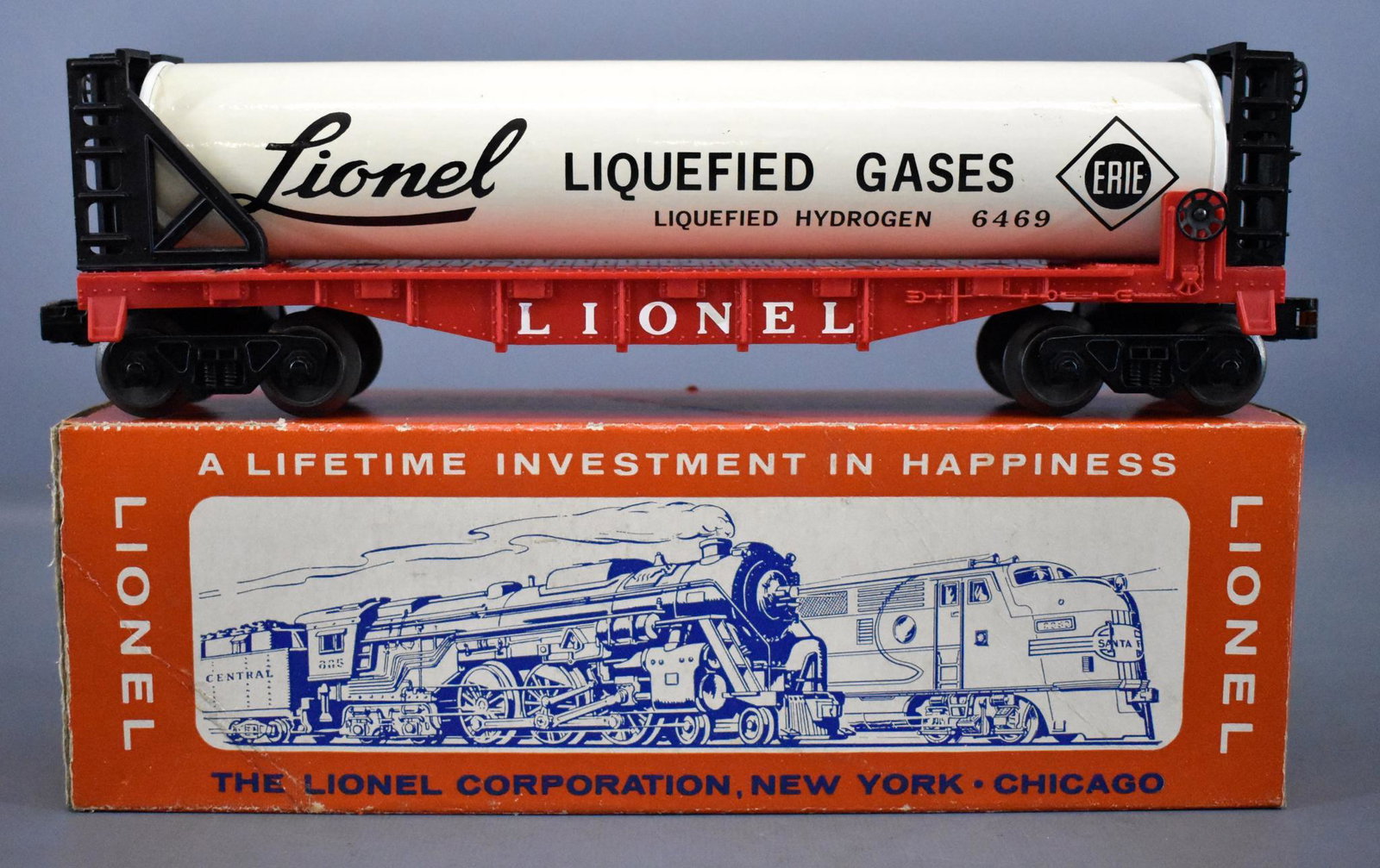 Lionel postwar O 6469 liquefied gas tank car in: Lionel postwar O 6469 liquefied gas tank car in original box, car shows very light run time and is C6-7 with glue residue holding the superstructures on the ends to the car. Comes with a good original