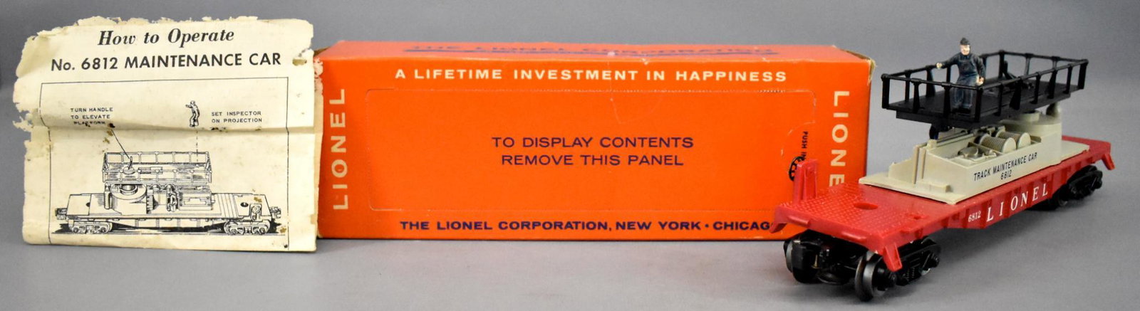 Lionel postwar O 6812 track maintenance car in original: Lionel postwar O 6812 track maintenance car in original box. Car shows light run time and is C7+ with no damaged or repaired railings in a very good perforated window box an a bug damaged original ins
