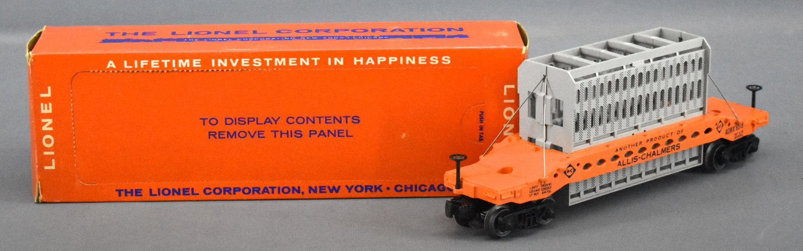 Lionel postwar O 6519 Allis Chalmers car in original: Lionel postwar O 6519 Allis Chalmers car in original box. Car shows light run time and has a brake stand crack on one end only. It is still intact with no repairs, this is the dark orange variation. C