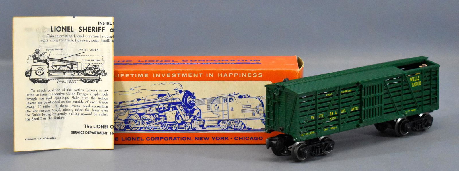 Lionel postwar O 3370 animated sheriff and outlaw car: Lionel postwar O 3370 animated sheriff and outlaw car in original box, car shows light run time but both figures are missing paint from their hats and elsewhere as seen in the photos, C7, comes with a