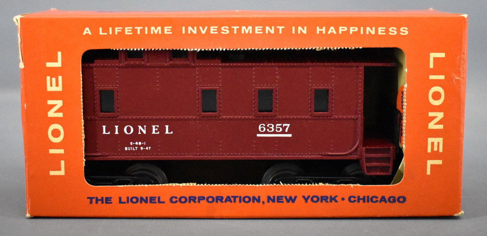 Scarce LATE Lionel postwar O 6357 caboose with plastic: Scarce LATE Lionel postwar O 6357 caboose with plastic trucks in original box, car shows little to no run time and is C8 in a good original box that is missing the perforated panel.