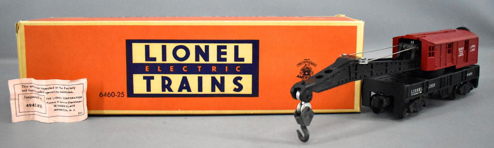 Mint unrun Lionel postwar O 6460-25 red painted cab: Mint unrun Lionel postwar O 6460-25 red painted cab operating work crane in original box, C9-10 in a very good original box with original instruction sheet and an original inspection slip.
