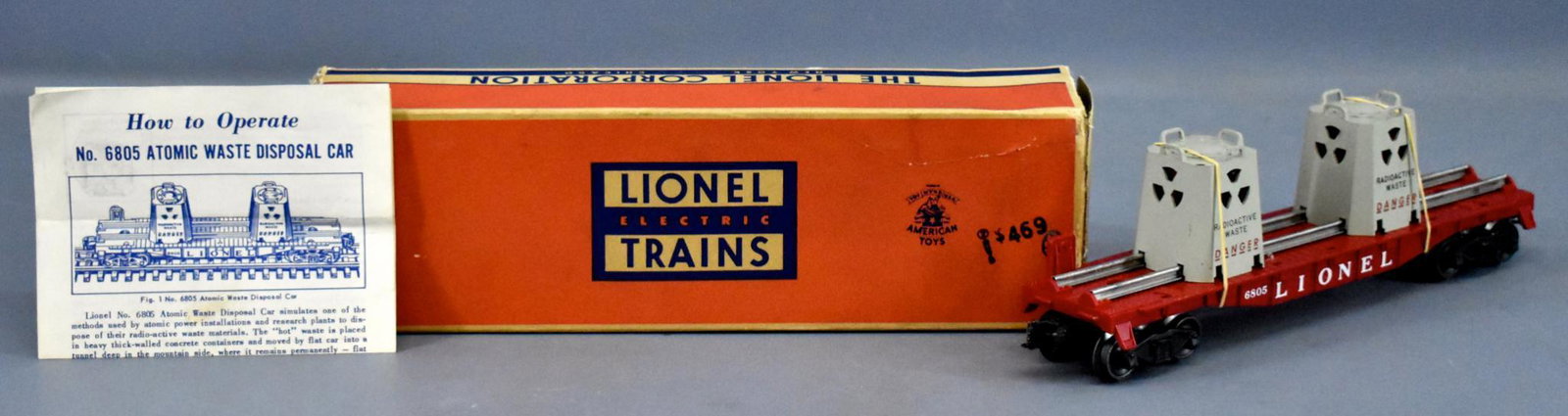 Lionel postwar O 6805 atomic energy disposal car in: Lionel postwar O 6805 atomic energy disposal car in original box, shows moderate run time and is C7-8 with no damaged or repaired railings or grab irons on the canisters in a good original box that ha
