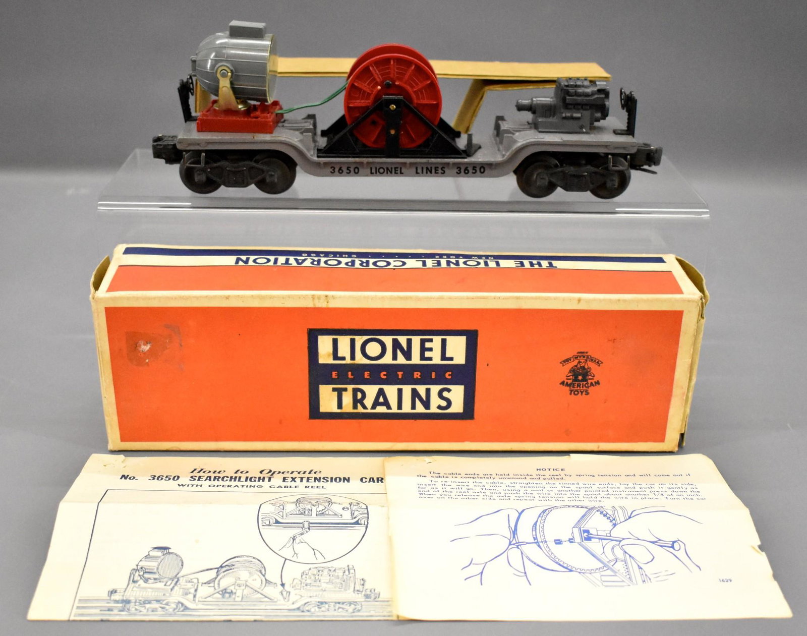 Unrun DARK GRAY Lionel postwar O 3650 searchlight: Unrun DARK GRAY Lionel postwar O 3650 searchlight extension car, C8-9 with a very good original box and two separate original instruction sheets.